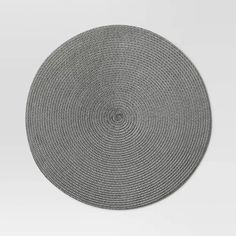 a round placemat made out of woven fabric