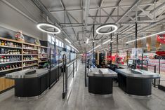 an empty grocery store with lots of shelves