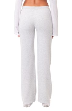 Let 'em know you're here for the drama in stretchy, cotton fleece pants slung in a low-rise fit. 50% cotton, 50% spandex Machine wash, dry flat Imported Basic Loungewear Pants With Comfort Waistband, Basic Comfort Stretch Bottoms For Loungewear, Basic Comfort Waistband Lounge Pants, Cotton Lounging Bottoms, Basic Fitted Loungewear Bottoms, Basic Fitted Bottoms For Loungewear, Gray Stretch Straight Sweatpants, Basic Stretch Sweatpants With Ribbed Waistband, Comfortable Full-length Bottoms With Comfort Stretch