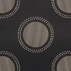 a black and white rug with circles on it