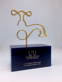 an award for leading utilities of the world is displayed in front of a white background