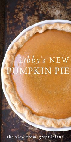 a pumpkin pie on a plate with the words libby's new york pumpkin pie