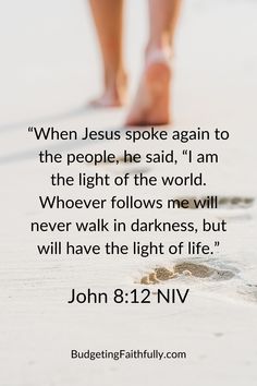 a person walking on the beach with a bible verse about jesus spoke again to the people he said,'i am the light of the world whoever follows me will never walk in darkness, but