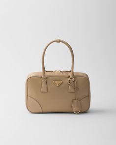 Camel Brown Prada Re-edition 1978 Medium Re-nylon And Saffiano Leather Two-handle Bag | PRADA Beige Bag Outfit, Prada Vintage Bag, Studded Leather Bag, Leather Key Ring, Prada Re Edition, Bag Prada, Luggage Bags Travel, Prada Accessories, Mens Travel Bag