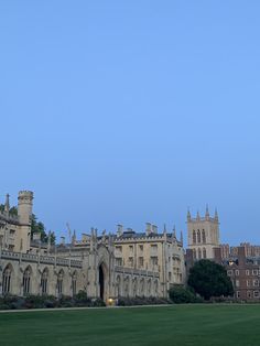 an old building with a clock tower in the background