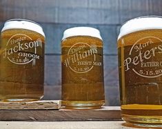 three beer glasses sitting on top of a wooden table next to each other with the words miller's groom written on them