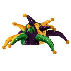 Jester Mardi Gras Velvet HatMade of 100% polyester.One size fits most with elastic string brim, fitting up to 7 3/8.Crown measures 4 inches deep, with 3 jsters.Soft, thick and light material.Hand wash only.Available in many styles.Imported. This unique and crazy Jester Mardi Gras Velvet Hat is sure to bring you and your friends some fun, especially for any Mardi gras celebration. It stays on your head easily so you can enjoy your fun without worrying about this hat falling off of your head. This Mardi Gras Jester, Court Jester, Jester Hat, Velvet Hat, Mardi Gras Party, Sticker Patches, Costume Hats, Party Hat, Patch Design