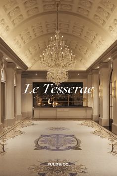 an elegant lobby with chandelier, chandeliers and carpeting in french