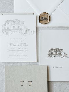 the wedding stationery is laid out and ready for guests to arrive at their reception