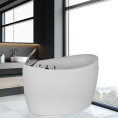 a large white bath tub sitting next to a window