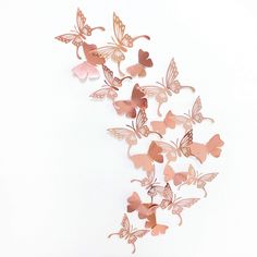 PRICES MAY VARY. PACKAGE CONTAINS- Rose gold butterfly wall decor set include 48pcs,The Swallowtail butterflies has 2 styles in 2 size：solid and hollow. Medium Size：10*8.6cm ，Small size:8*6.9cm. ENVIROMENTAL MATERIAL-These rose gold 3d butterfly wall decals are different from other butterfly decals,they are via special processing both lightweight and luxuriant,environmental. LONGLIFE USING-These rose gold 3d butterfly wall decals stickers are perfect for nursey/girls/kids room decor,they are rem Pink Butterfly Decorations, Murals For Home, Metallic Art, 3d Wall Decals, Rose Gold Butterfly, Wood Butterfly, Rose Gold Paper, Butterfly Wall Decals, Butterfly Decal