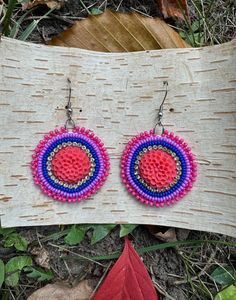 Handmade Bisexual & Two Spirit pride beaded earrings made with size 11 seed beads, floral center, metal findings, and on surgical steel earring hooks. Pride Earrings, Surgical Steel Earrings, Earring Hooks, Beaded Earrings, Seed Beads, Jewelry Earrings Dangle, Dangle Drop Earrings, Dangle Earrings, Jewelry Earrings