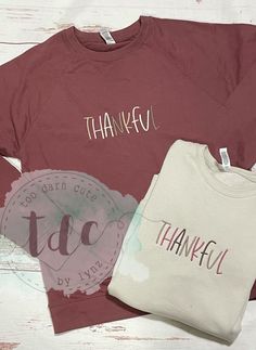 three t - shirts with the words thank written on them, one in red and one in white