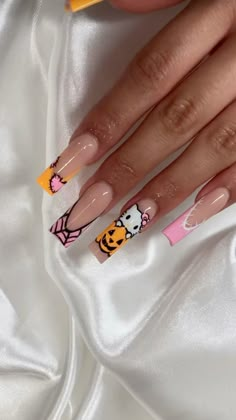 Get ready to embrace the fall season with Halloween and autumn- inspired nail designs! From cozy fall tones to cutesy hello kitty halloween inspired nails🎃 these nails capture the magic of fall Cute Nail Designs Hello Kitty, Pink Hello Kitty Halloween Nails, Orange Hello Kitty Nails, Leopard Halloween Nails, Cute Spooky Halloween Nails, Yellow Hello Kitty Nails, Halloween Hello Kitty Nails Short