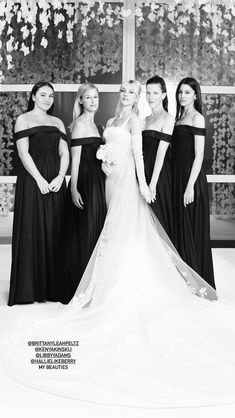 black and white photograph of bride with her bridesmaids