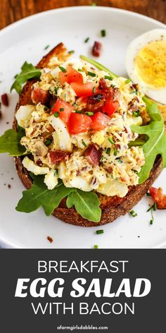 the breakfast egg salad with bacon on toast is ready to be eaten and served for lunch