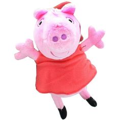 a pink stuffed pig wearing a red dress and black shoes with her arms out in the air