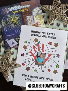 new year's eve cards with fireworks and sparkles on them, including a card that says wishing you extra sparkle and cheer