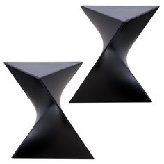 two black tables sitting next to each other