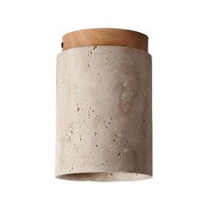 a concrete light fixture with a wooden top