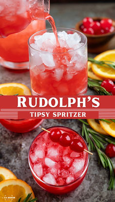 a red drink being poured into a glass with ice and cranberries on the side