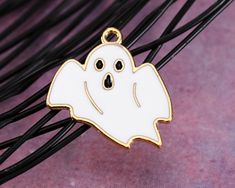 Bring a bit of spooky fun to your crafting with this cute enamel ghost charm. It's just the right size for adding a ghostly touch to Halloween-themed charm bracelets or dangling earrings. Metal Animal, Halloween Charms, Felt Garland, Metal Shop, Bead Store, Ghost Halloween, Beads Online, Mala Necklace, Enamel Charms