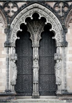 an old church door with carvings on it