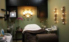 a spa room with lights on the wall