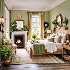 a bedroom with green walls, white bedding and a fireplace in the corner between two windows