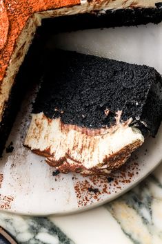 a piece of cake sitting on top of a white plate