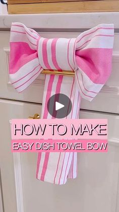 a pink and white striped bow tie hanging on a cabinet door with the words how to make easy dish towel bow