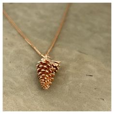 Inspired by nature, this 14k gold Pinecone necklace is the perfect necklace for everyday wear. Add some rustic charm to your outfit with this dainty layering necklace. Perfect as a gift to your mom, wife, best friend or any of your loved ones! It's minimalistic and full of chic. Handmade with careful attention to details.  Available in either yellow/rose or white gold. Gold Pinecone Necklace - Minimalist Necklace - Dainty Necklace - Everyday Necklace - Gift for Her - Unique Gift -Valentine's Day Pine Cone Necklace, Pinecone Necklace, Dainty Necklace Layered, Pendent Necklace, Everyday Necklace, Classic Jewelry, Delicate Rings, Gift For Wife, Pine Cone