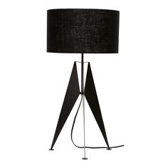 a black lamp on a white background with a black shade in the center and an iron base