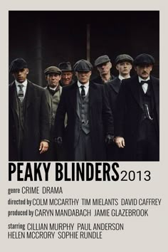 a group of men standing next to each other in front of a white sign that says peaky binders 2013