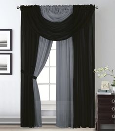 black and gold curtains hanging on the wall