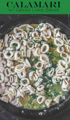 a skillet filled with pasta and spinach sauce