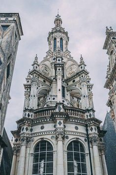 an ornate building with many windows on it