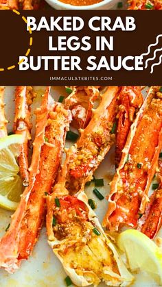 baked crab legs in butter sauce with lemon wedges