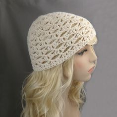 "Soft, lightweight lacy beanie, wool hat/beanie.  This pretty hat / beanie is hand made in the USA using top quality Italian yarn and made to order. All items are made in a smoke-free, pet-free environment. Details: - #DC1 Crochet hat / beanie - Hat shown in pictures: Ivory   - Select from 11 colors  - Fiber Content: Merino wool, nylon - Care: Hand wash, dry flat. Size:  - Women size fits head circumference 20\"-23\" (50-58 cm), Height: 7 inches (17.75 cm);  Want a different size? - This hat can be made to order; Let us know the size you need. - Please allow 3-5 business days for production. Please note that while we make every effort to accurately represent the colors of the item. please note that your monitor settings may affect the appearance of these colors on your screen.  Please refe Pretty Hats, Bonnet Crochet, Crochet Woman, Wool Hat, Cool Hats, Skull Cap Beanie, Crochet Beanie, Skull Cap, Beanie Hats