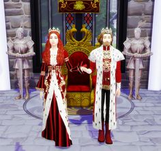 two people standing next to each other in front of a throne