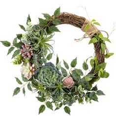 a wreath with succulents and greenery on it