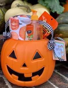 a pumpkin shaped container filled with personal care items