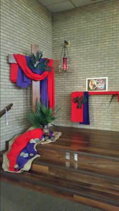 a wooden table topped with lots of red and purple decorations