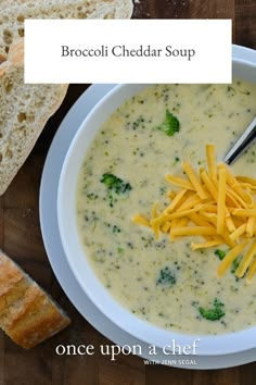 broccoli cheddar soup in a white bowl with bread on the side