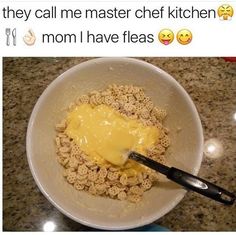 a bowl filled with cereal sitting on top of a counter