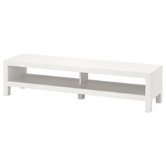 a white coffee table with two shelves on each side