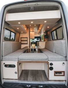 the interior of a camper van with its door open