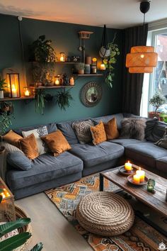 a living room filled with lots of furniture and candles on top of the coffee table