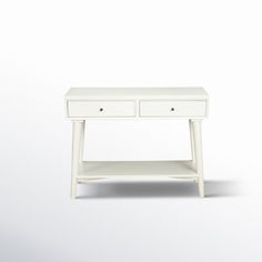 a small white table with two drawers on one side and an open drawer on the other