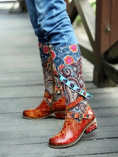 With a stunning floral print design and a cow leather construction, these boots take your footwear game to the next level and ensure a bold look. 1.57'' heel 14.8 shaft 14.2 circumference Zip closure Genuine leather upper Leather / Textile lining Leather footbed Leather midsole Rubber sole Cowgirl Things, Whimsical Shoes, Art Boots, Look Hippie Chic, Bohemian Boots, Embossed Boots, Festival Ideas, Western Shoes, Breakfast Casseroles